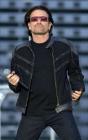 Bono, lead singer of Irish rock band U2 performs during a concert at the King Baudouin Stadium in Brussels June 10, 2005. U2 is currently on their 'Vertigo 2005' world tour with Brussels being the first concert in Europe. REUTERS/Str